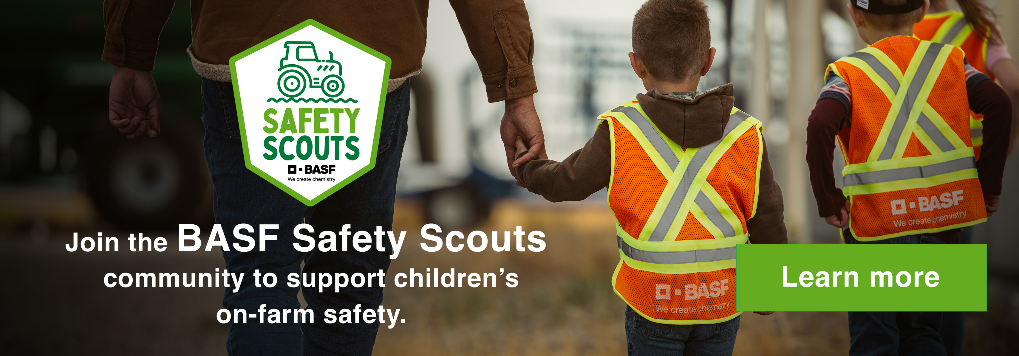 Children walking with safety vest holding parent's hand