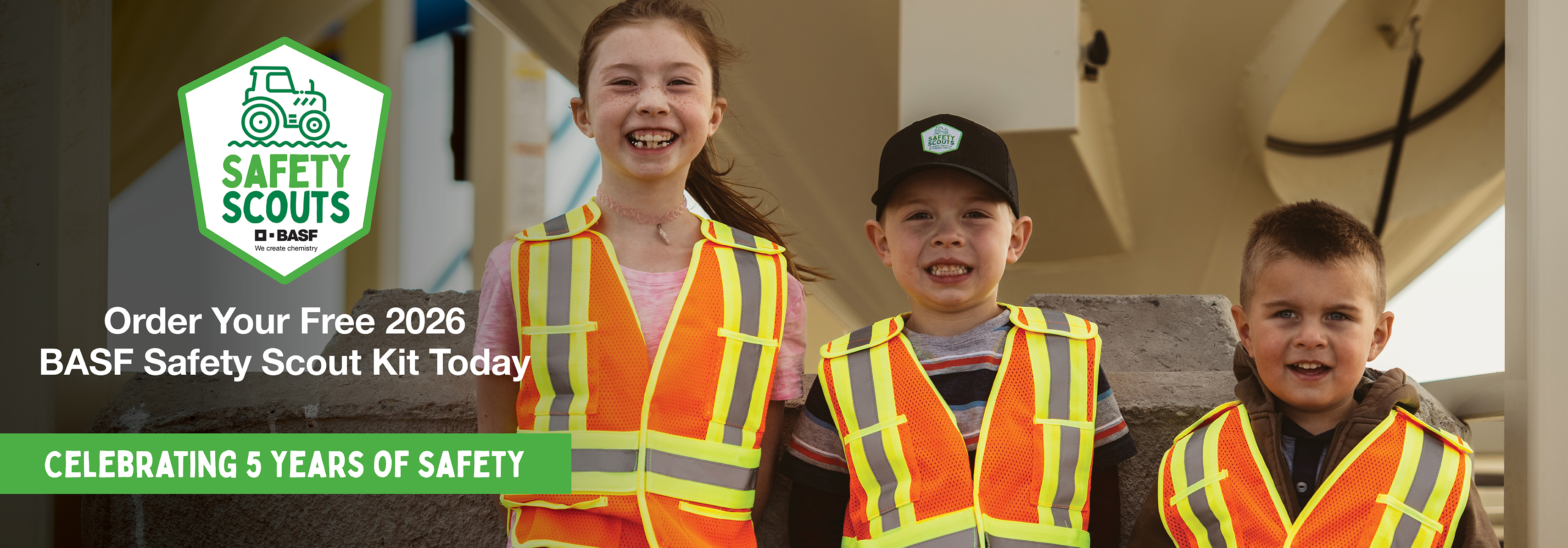 BASF Safety Scouts - Children wearing orange safety vests and smiling