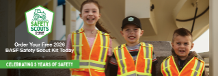 BASF Safety Scouts - Children wearing orange safety vests and smiling