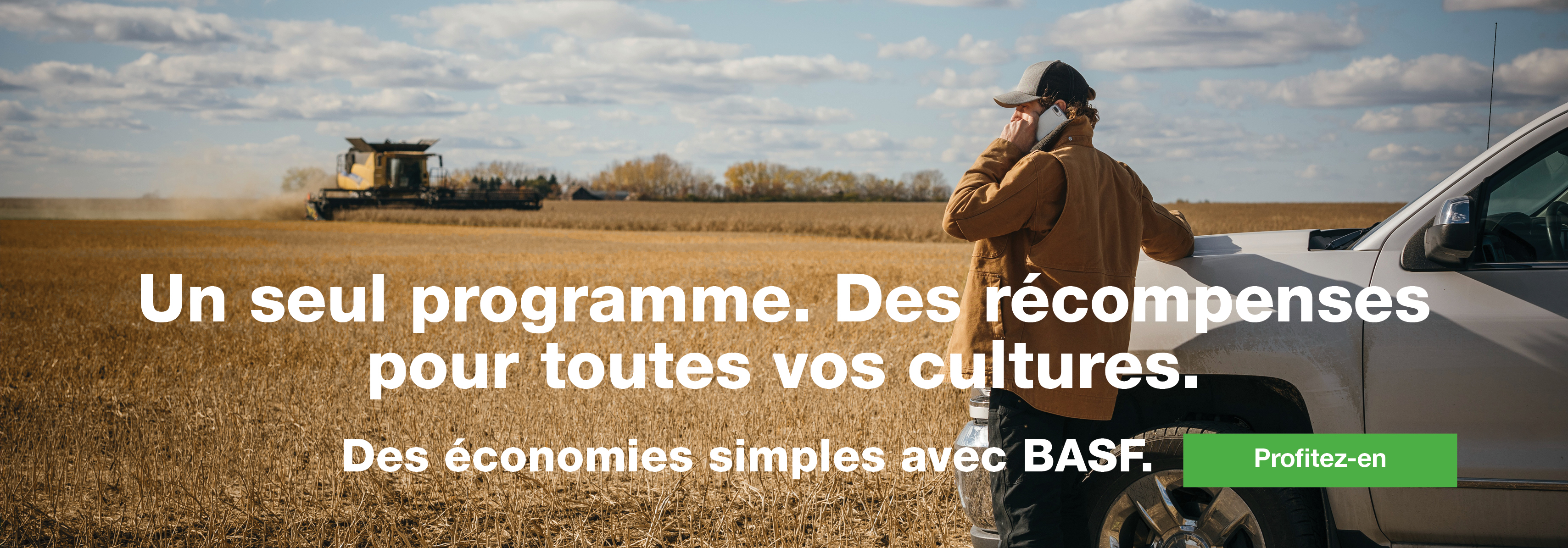 Farmer in field talking on the phone